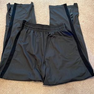 Men’s Nike Dri-Fit basketball pants, large, grey with black stripes down sides